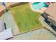 Birds eye view of property showing pool, lush green yard and convenient access to the additional detached storage shed at 1186 E Brenda Dr, Casa Grande, AZ 85122