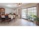 Dining room with fireplace and large sliding glass doors leading to an outdoor area at 1186 E Brenda Dr, Casa Grande, AZ 85122