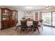 Dining room with a fireplace, a china cabinet, and a table with seating for six at 1186 E Brenda Dr, Casa Grande, AZ 85122