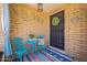 Charming front porch with colorful decor and a welcoming atmosphere at 1186 E Brenda Dr, Casa Grande, AZ 85122