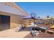 Fun backyard play area featuring a swing set, slide, and other engaging activities for to enjoy at 1186 E Brenda Dr, Casa Grande, AZ 85122
