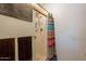 Shower includes storage for toiletries and a colorful shower curtain at 1186 E Brenda Dr, Casa Grande, AZ 85122