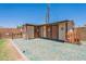 Backyard storage shed with double doors and star decorations, providing ample space for tools and equipment at 1186 E Brenda Dr, Casa Grande, AZ 85122