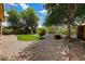 A beautiful backyard featuring an artificial putting green, enhancing the outdoor recreational space at 12775 W Lowden Rd, Peoria, AZ 85383