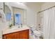 Bathroom featuring a vanity, large mirror, and shower/tub combo at 12775 W Lowden Rd, Peoria, AZ 85383