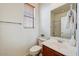 Bathroom with vanity, mirror, and tiled shower/tub combo at 12775 W Lowden Rd, Peoria, AZ 85383
