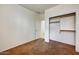 This is a nice empty bedroom area with carpet, and a closet in the corner at 12775 W Lowden Rd, Peoria, AZ 85383