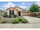 Beautiful single-story home with desert landscaping, a front porch, and an attached two-car garage at 12775 W Lowden Rd, Peoria, AZ 85383