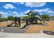Community playground featuring multiple slides, climbing structures, and shaded seating area at 12775 W Lowden Rd, Peoria, AZ 85383