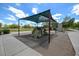 Community playground with a climbing structure, slide, and sunshade for  at 12775 W Lowden Rd, Peoria, AZ 85383