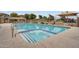 Sparkling community pool and spa with mosaic tile accents, surrounded by landscaped grounds at 12775 W Lowden Rd, Peoria, AZ 85383