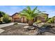 Charming single-story home featuring desert landscaping and a well-manicured front yard at 12903 W Brookhart Way, Peoria, AZ 85383