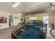 Garage interior showing ample space, lighting, and organization at 12903 W Brookhart Way, Peoria, AZ 85383