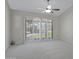 Bright carpeted bedroom featuring wide shutters and a ceiling fan at 13010 S 42Nd St, Phoenix, AZ 85044