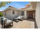 Relaxing courtyard with outdoor seating and a brick-paved floor, perfect for entertaining guests at 13010 S 42Nd St, Phoenix, AZ 85044