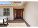 Inviting front door with glass sidelights and stylish brick-paved entryway at 13010 S 42Nd St, Phoenix, AZ 85044