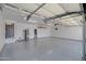 Spacious garage with epoxy flooring, storage and insulated doors at 13010 S 42Nd St, Phoenix, AZ 85044