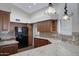 Well-appointed kitchen with mosaic tile backsplash, and granite countertops at 13010 S 42Nd St, Phoenix, AZ 85044