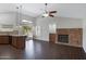 Comfortable living room with a brick fireplace, ideal for cozy evenings at 13010 S 42Nd St, Phoenix, AZ 85044