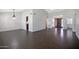 Spacious living room features wood-look tile flooring and plenty of natural light at 13010 S 42Nd St, Phoenix, AZ 85044