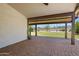 Covered patio featuring brick pavers and view of the landscaped backyard, perfect for outdoor relaxation at 13010 S 42Nd St, Phoenix, AZ 85044