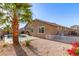 Backyard featuring a patio, pool, and low-maintenance landscaping, perfect for outdoor living and relaxation at 13153 W Cottontail Ln, Peoria, AZ 85383