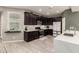 Spacious kitchen with modern appliances, ample counter space, and stylish cabinetry at 13153 W Cottontail Ln, Peoria, AZ 85383