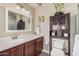 Bathroom featuring vanity with lots of cabinet space, lighting, and decorative touches at 15095 N Thompson Peak Pkwy # 1005, Scottsdale, AZ 85260