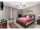 Inviting bedroom with decorative accents, including unique wall art and a cozy patterned rug at 15095 N Thompson Peak Pkwy # 1005, Scottsdale, AZ 85260