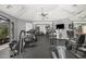 Community gym with fitness equipment and mounted television at 15095 N Thompson Peak Pkwy # 1005, Scottsdale, AZ 85260