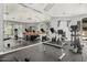 Community gym featuring weight machines and free weights at 15095 N Thompson Peak Pkwy # 1005, Scottsdale, AZ 85260