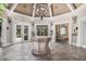 Lobby with tiled floors, stone table, and decorative lighting at 15095 N Thompson Peak Pkwy # 1005, Scottsdale, AZ 85260