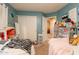 Inviting bedroom with twin beds and ample toy storage, perfect for play at 15211 N 89Th Ave, Peoria, AZ 85381