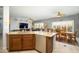 Open-concept kitchen boasts granite counters, stainless appliances, and seamless flow to the living areas at 15658 W Arbor Trl, Surprise, AZ 85374