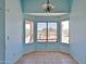 Eat-in kitchen area featuring a large bay window overlooking the yard at 16242 W Caribbean Ln, Surprise, AZ 85379
