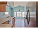 Bright eat-in kitchen area featuring a large window overlooking the yard at 16242 W Caribbean Ln, Surprise, AZ 85379