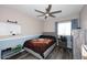 Bedroom featuring a baseball bedspread, ceiling fan and neutral wall tones at 1640 W Gail Dr, Chandler, AZ 85224