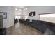 Open-concept living space with dining area, comfortable seating, and large windows for natural light at 1640 W Gail Dr, Chandler, AZ 85224