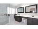 Bright main bathroom featuring a walk-in shower and dual sink vanity at 1640 W Gail Dr, Chandler, AZ 85224