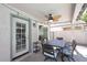 Cozy covered patio offers outdoor dining beneath a ceiling fan at 1640 W Gail Dr, Chandler, AZ 85224