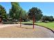 Community playground area featuring a red swing set at 1640 W Gail Dr, Chandler, AZ 85224