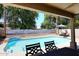 Inviting backyard oasis with a sparkling pool and mature landscaping at 1640 W Gail Dr, Chandler, AZ 85224