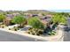 Beautiful home with solar panels, desert landscaping, and mountain views at 18108 W Thunderhill Pl, Goodyear, AZ 85338