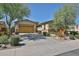 Charming single-Gathering home with a two-car garage and lush desert landscaping at 18108 W Thunderhill Pl, Goodyear, AZ 85338