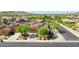 Charming home with well-maintained landscaping and neighborhood street view at 18108 W Thunderhill Pl, Goodyear, AZ 85338