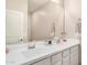 Bright bathroom featuring double sinks, a large mirror, and ample counter space at 1825 E Hampton Ln # 108, Gilbert, AZ 85295