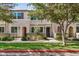 Inviting townhouse with well-maintained landscaping, enhancing curb appeal at 1825 E Hampton Ln # 108, Gilbert, AZ 85295