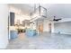 Bright, open layout featuring modern kitchen with stainless steel appliances and spacious living area at 1849 S 96Th St, Mesa, AZ 85209