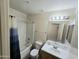 Bathroom featuring a shower-tub combo, toilet, and vanity with sink at 1918 S Ocotillo Dr, Apache Junction, AZ 85120