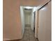 Hallway with tile flooring that leads to other rooms at 1918 S Ocotillo Dr, Apache Junction, AZ 85120